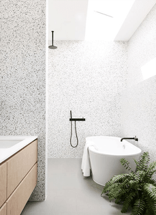 23-lighter-terrazzo-in-the-shower-and-bathtub-zone-and-darker-in-the-sink-zone.jpg