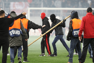 olympiacos-hooligans-clash-with-police-after-aek-defeat.jpg