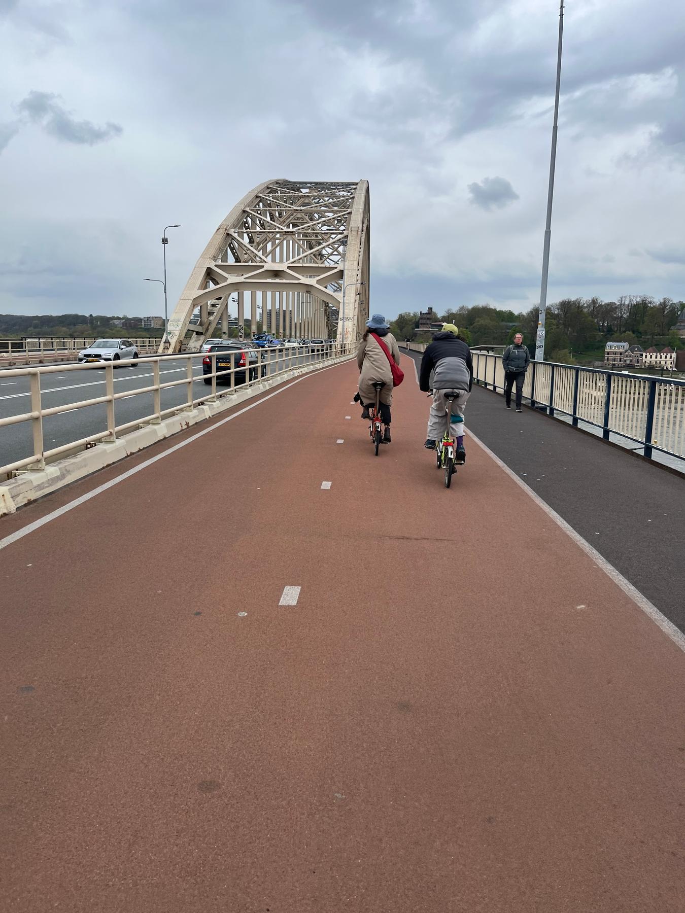 E-mother and E-father crossing the bridge