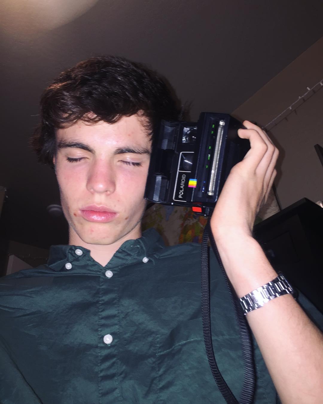 I bet your man doesn't use his Polaroid camera as a phone
