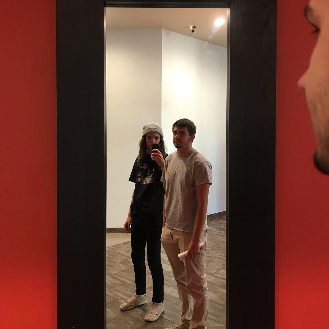 Same mirror, same beanie, different roommate