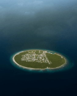 “Foakaidhoo is one of 16 inhabited islands in the Shaviyani Atoll of the Maldives. Covering an area of about 0.25 square miles (0.66 square km) in the Arabian Sea, it is home to roughly 1,320 people. The island has several privately-owned shops, a health center, a school for children in preschool through grade 10, and other basic community centers.”