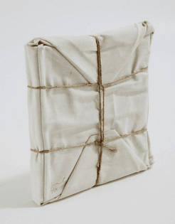 Packaging | Package | Minimal | White | Wrapped Book, 1973 by Christo | tumblr_mo7eezvvuj1qhwveto1_500.jpg