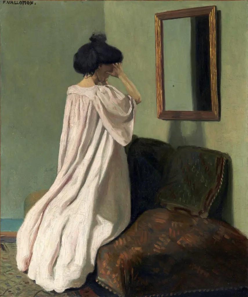 felix-vallotton-agenouillee-devant-une-glace-sur-le-divan-de-latelier-de-la-rue-des-belles-feuilles-1905.jpg.webp