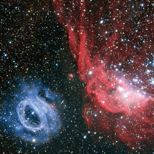 Two_very_different_glowing_gas_clouds_in_the_Large_Magellanic_Cloud.jpg