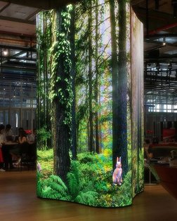 hyperreal forest scene displayed on an led screen (wrapped around a pillar) at a store in bangkok lol I think about this a lot