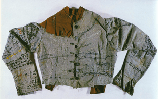 Linen jacket – Agnes Richter (1895), a seamstress who was incarcerated in an Austrian asylum during the late 1800′s and who embroidered her life story onto the jacket as an attempt to express her identity