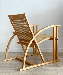 This amazing chair is still available 💗. 1984 beech wood and cane lounge chair by Pascal Mourgue for Tricofort, France. $132...