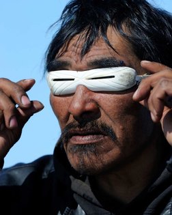 Snow googles, "iglaak (ᐃᓪᒑᒃ) or iggaak (ᐃᒡᒑᒃ)" in Inuktitut are a type of eyewear traditionally used by the Inuit and the Yu...