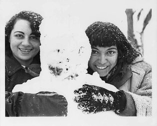 Tonya Sprager and Aurora Cassotta in the snow at Black Mountain College, Lake Eden campus, ca. 1942.