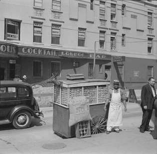 Peanut wagon on Lenox Avenue and 133rd Street