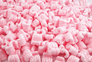 2391971-Pink-foam-packaging-peanuts-for-use-as-background-or-concept-Stock-Photo.jpg