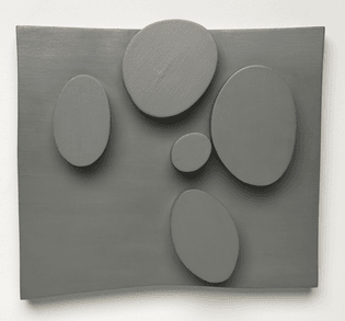Hans Arp, Objects organized according to case law III (1931; oil on panel, 25.7 x 28.9 x 6 cm; San Francisco, San Francisco Museum of Modern Art)