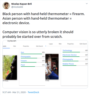 "Black person with hand-held thermometer = firearm. Asian person with hand-held thermometer = electronic device." (Google's AI)