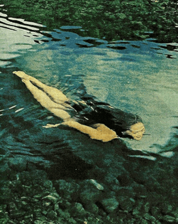 girl-dives-in-the-vaitepiha-river-tahiti-national-geographic-july-1962-.png