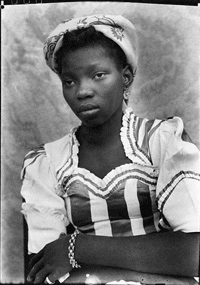 seydou-ke-ta-untitled-portrait-of-a-woman-with-folded-arms-1949-51.jpg