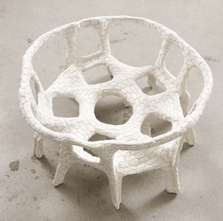 Ann Greene Kelly, Untitled (small circular bench), 2017, Plastic chairs, resin, wire, hardware, plaster, colored pencil, 13 × 21 × 27 ½ in.