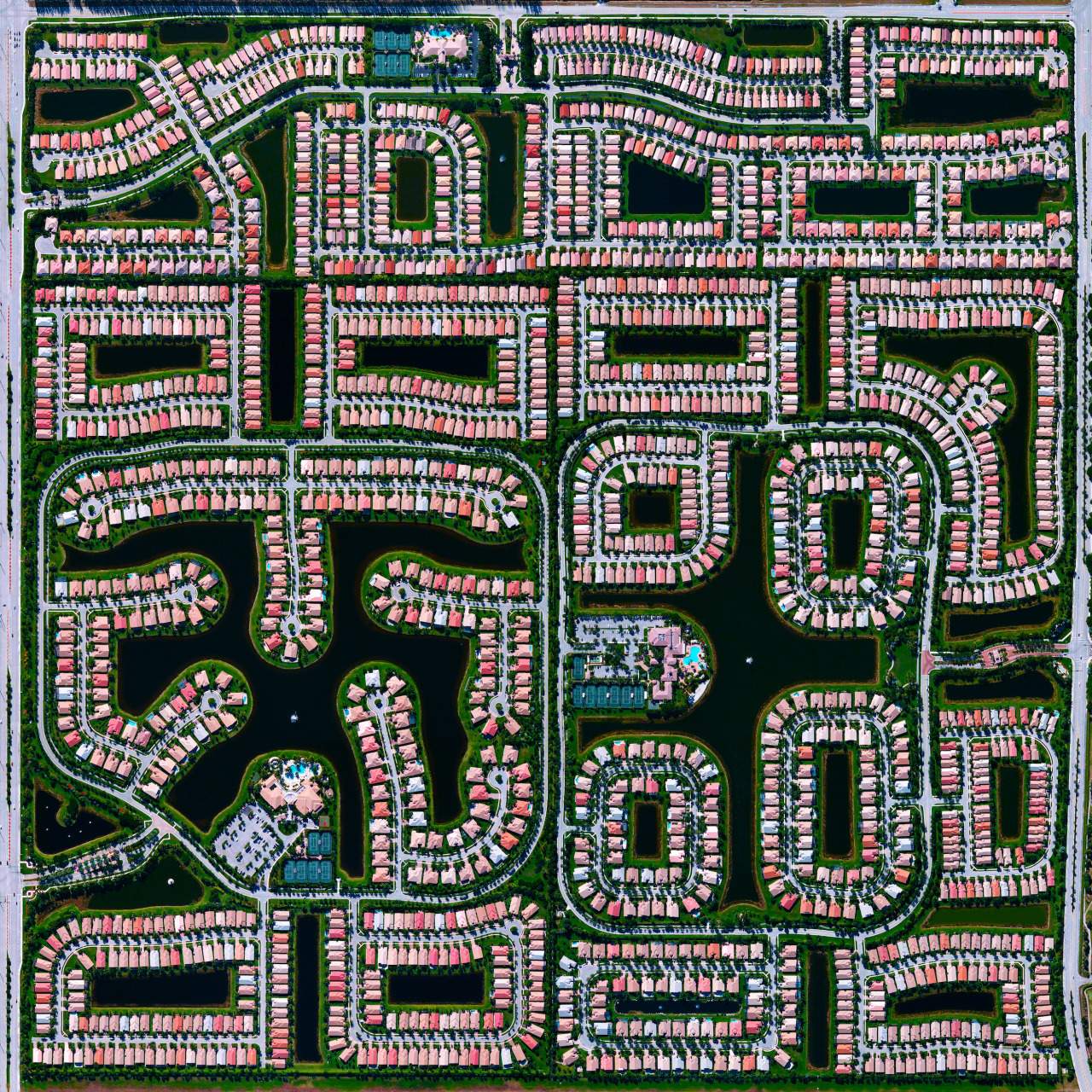 “This Overview shows residential development in Delray Beach, Florida. Because many cities in the state contain master-planned communities, often built on top of waterways in the latter half of the twentieth century, there are a number of intricate designs that are visible from above. According to the 2010 Census, 20.4% of the city’s homes were vacant.”