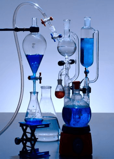 chemical-laboratory-glassware-with-blue-solutions.jpg