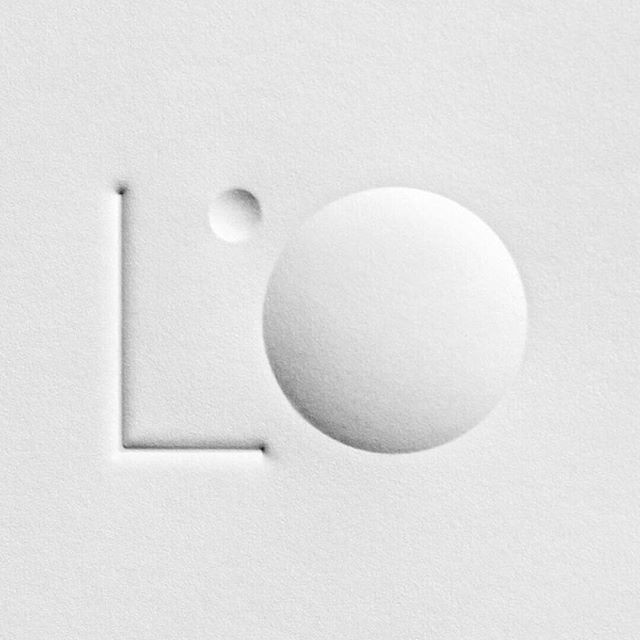 Logo for lighting design firm @lobservatoire_intl . Multi-level embossing on business card. #lobservatoire
