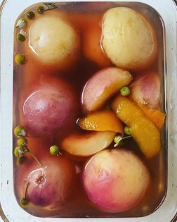 Poach now, serve later. White peach simmered in a honey + homegrown chamomile syrup.