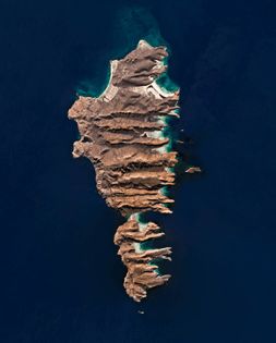 “Isla Espíritu Santo and Isla Partida are islands in the Gulf of California, located offshore Baja California Sur, México. Both islands are uninhabited and were once connected, but are now separated by a small canal. Despite pressure from real estate developers to construct a resort on Espíritu Santo, the two islands have been part of a UNESCO Biosphere Reserve since 1995.”