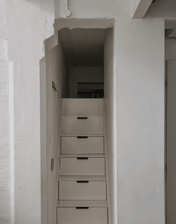 alastair-hendy-london-kitchen-stairs-with-storage-via-remodelista.jpg