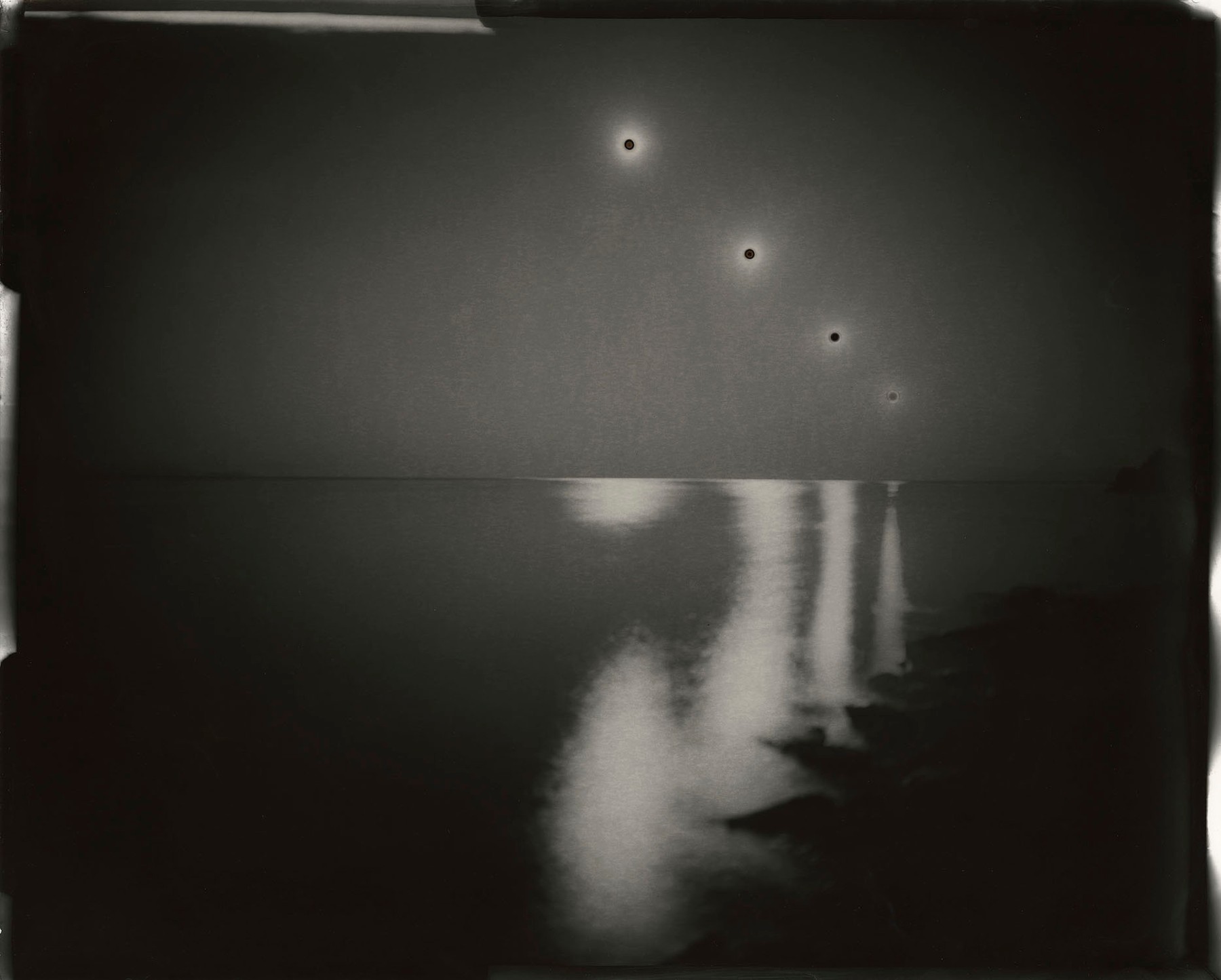 Chris McCaw - Sunburned GSP#202(SF Bay/expanding), 2008. 16"x20" unique gelatin silver paper negative.