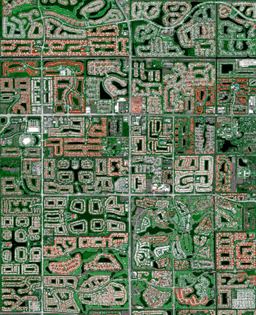 “Residential developments cover the landscape in Boynton Beach, Florida, USA. Because many cities in the state contain master-planned communities, often built on top of waterways in the latter half of the twentieth century, there are a number of intricate designs that are visible from the Overview perspective. Boynton Beach is home to roughly 78,000 residents.”
