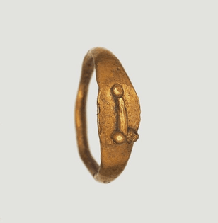 Roman child’s good luck ring with a phallus in relief from the British Museum.jpg
