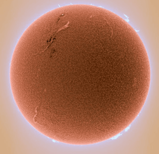 Photo of the sun taken through a telescope with an industrial webcam