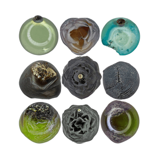 A collection of micrometeorites found in Antarctica, featured in the 2020 book Atlas of Micrometeorites.
