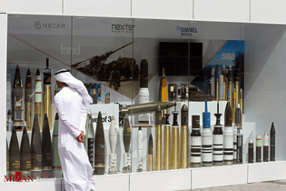 A visitor looks at munitions on display during the International Defence Exhibition and Conference (IDEX) in Abu Dhabi, United Arab Emirates February 19, 2017. REUTERS/Stringer