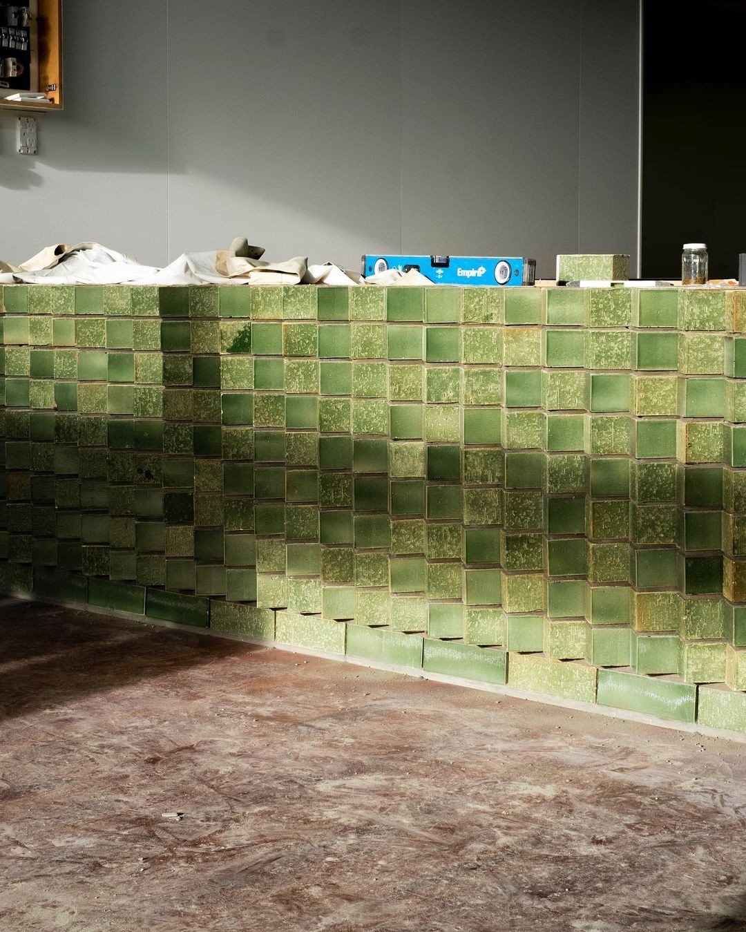 Work-in-progress shot of green-glazed brick counter for The Greenhouse, Auckland