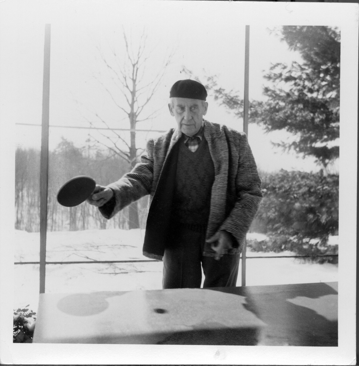 Walter Gropius playing Ping-Pong, Gropius House, Lincoln, Massachusetts, date unknown. Courtesy of Historic New England.