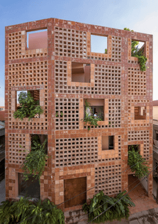 Vo Trong Nghia Architects wraps Bat Trang House in perforated ceramic brick facade