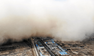 Sandstorm engulfs village in China's Gansu province
