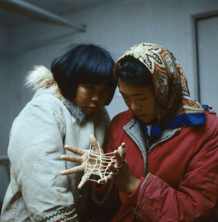 Photo by Rosemary Eaton • Cat’s Cradle - Iqaluit, Nunavut, c. 1960