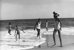 Chester Higgins Jr., Kids Playing at the Beach, 1973