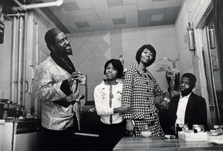 Thelonious Monk and his family: daughter Barbara, wife Nellie, and son T.S. (Toot)