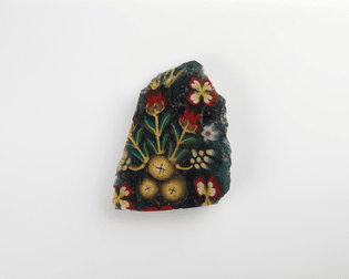 Fragment of an inlay with a floral pattern (mosaic glass). Egypt.