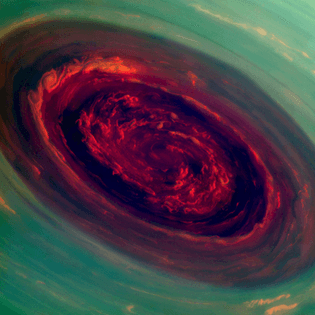 The spinning vortex of Saturn’s north polar storm resembles a deep red rose of giant proportions surrounded by green foliage in this false-color image from NASA’s Cassini spacecraft. Measurements have sized the eye at a staggering 1,250 miles (2,000 kilometers) across with cloud speeds as fast as 330 miles per hour (150 meters per second).  