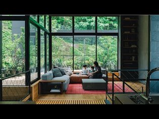 A Peaceful Japanese House Surrounded By Greenery