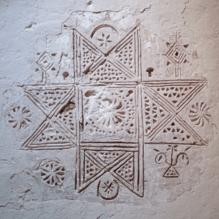Image  Plaster decoration in Ghadames house in Libya, photographed by Eric Lafforgue.
