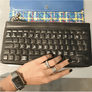 chanel-black-keyboard-and-blue-tweed-pouch-bags.png
