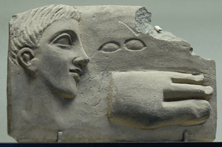 1920px-votive_plaque_louvre_mnb324.jpg