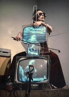 Charlotte Moorman performs Nam June Paik's TV Cello wearing TV Glasses, New York, 1971