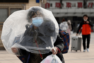 Woman uses a plastic bag for protection
