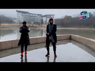 Two young men from DR Congo sing CGTN's Winter Olympics-themed rap
