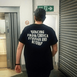 'Dancing From Corsica..' Tees are now back in stock and available at our bandcamp!! Design by @mattanddan_studio Modelled by @secretsundaze
